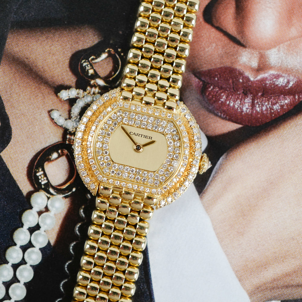 Café Noir Les Montres Marseille Cartier Ellipse femme réf. 67081 bracelet en maille en or jaune 18 carats diamants bracelet serpent commande spéciale vintage 1990