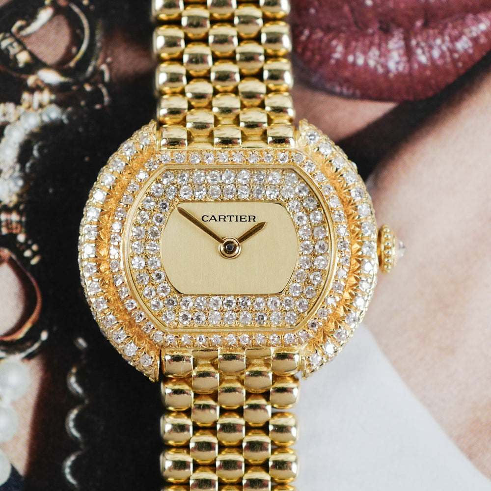 Café Noir Les Montres Marseille Cartier Ellipse femme réf. 67081 bracelet en maille en or jaune 18 carats diamants bracelet serpent commande spéciale vintage 1990