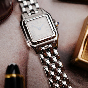 cafe noir les montres vintage cartier Panthère ref 1320 petit modèle tout acier pour femme vintage 1990