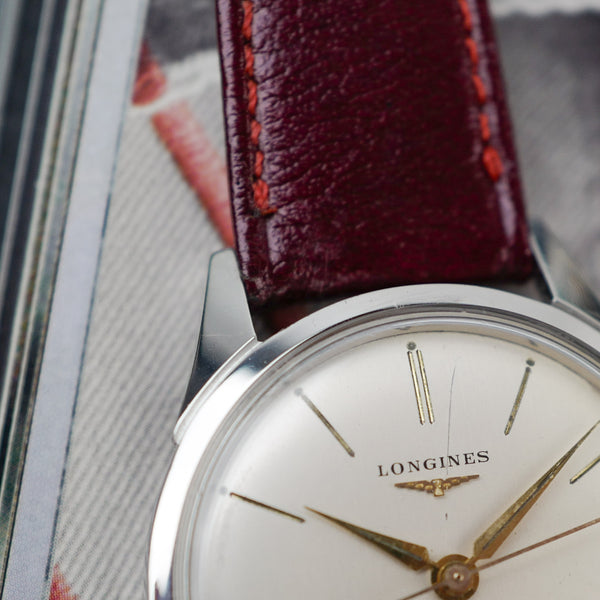 extra fine cafe noir les montres vintage horloger marseille montres vintage LONGINES Calatrava 7158 acier cadran blanc 1960