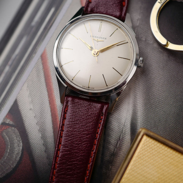 extra fine cafe noir les montres vintage horloger marseille montres vintage LONGINES Calatrava 7158 acier cadran blanc 1960