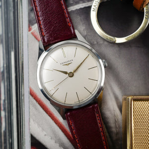 extra fine cafe noir les montres vintage horloger marseille montres vintage LONGINES Calatrava 7158 acier cadran blanc 1960