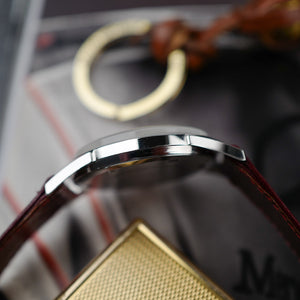 extra fine cafe noir les montres vintage horloger marseille montres vintage LONGINES Calatrava 7158 acier cadran blanc 1960