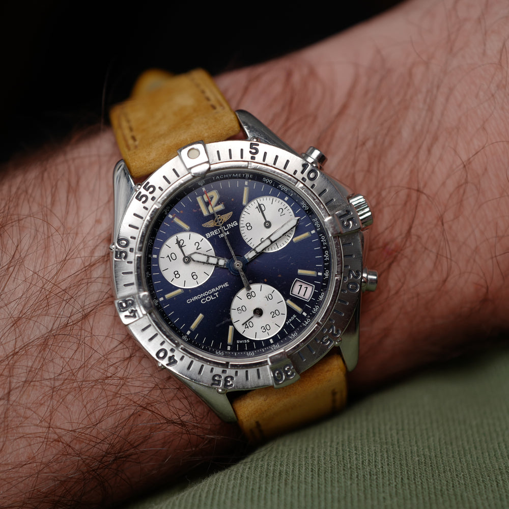 Café noir montre vintage Marseille horloger Breitling Colt chronograph a53035 bleu 1990
