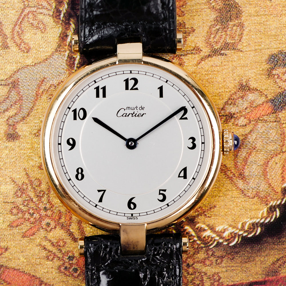 Café noir montre vintage Marseille horloger Cartier Must Vendôme ronde vermeil 1980