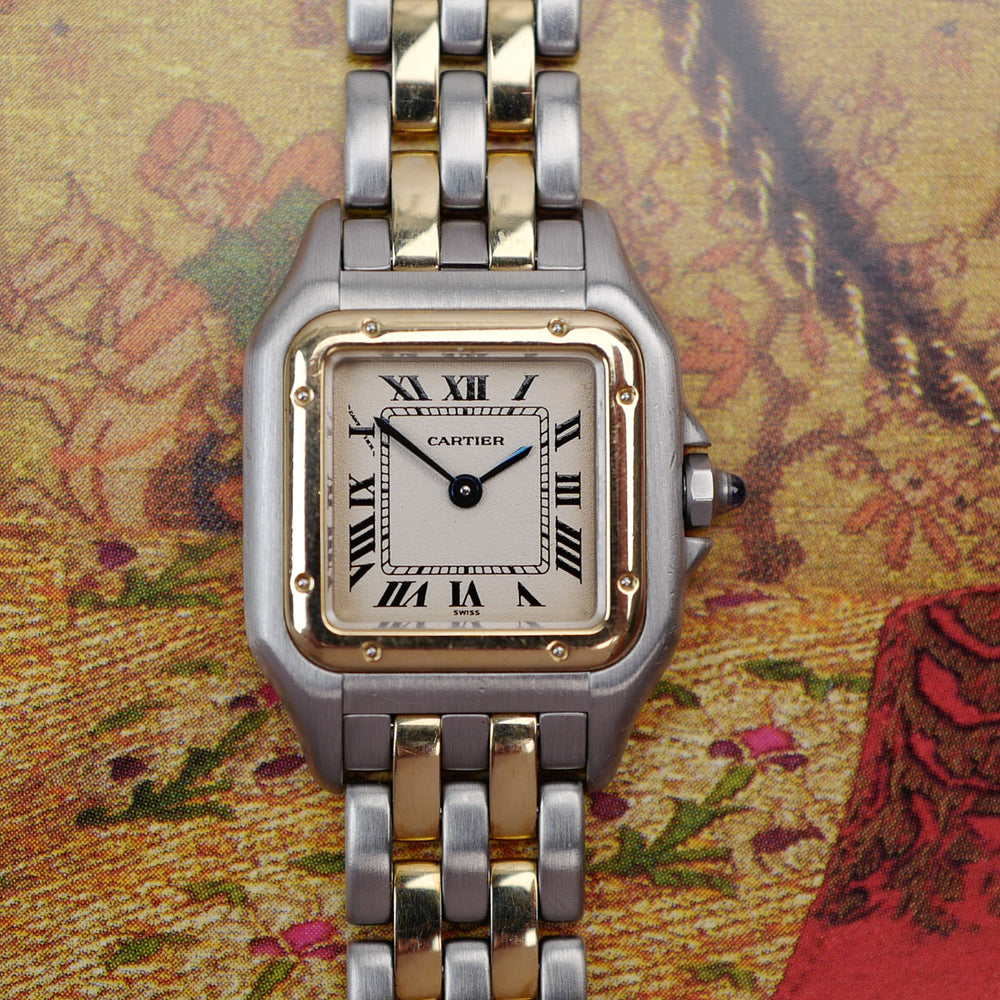 Café noir montre vintage Marseille horloger Cartier panthère petit modèle or acier vintage 1990