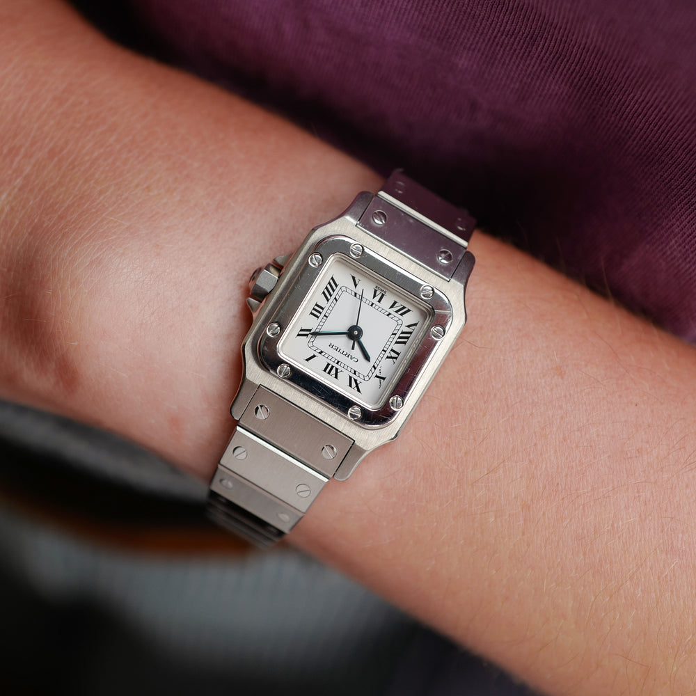 Café noir montre vintage Marseille horloger Cartier Santos galbée petit modèle acier automatique 1990
