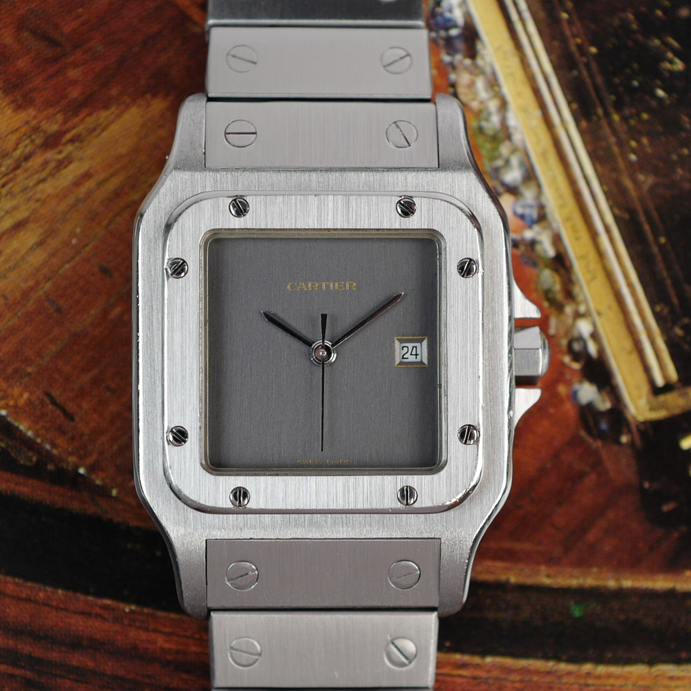 Café noir montre vintage Marseille horloger Cartier Santos ghost gris 2960