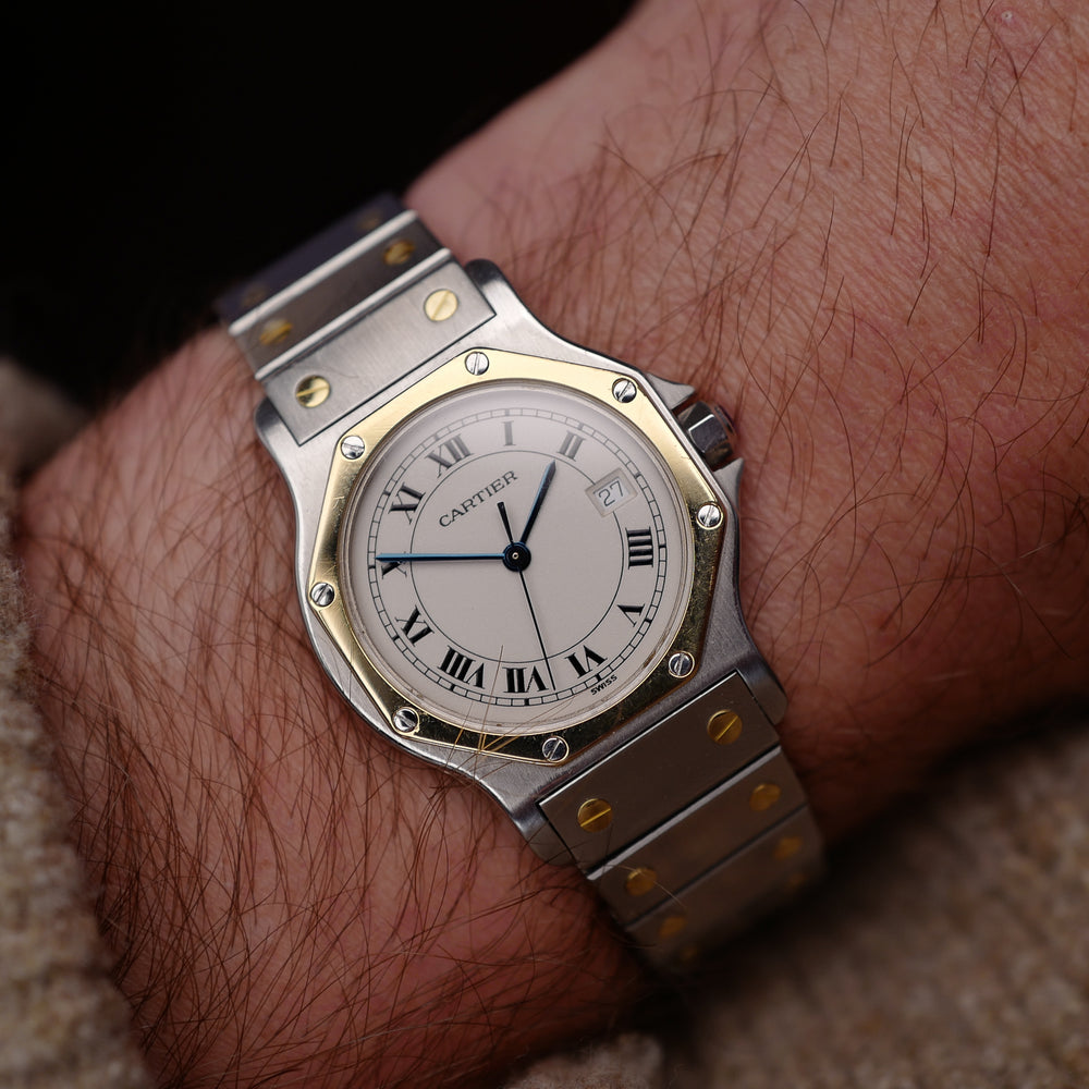 Café noir montre vintage Marseille horloger Cartier Santos octogonale quartz bicolore 1990