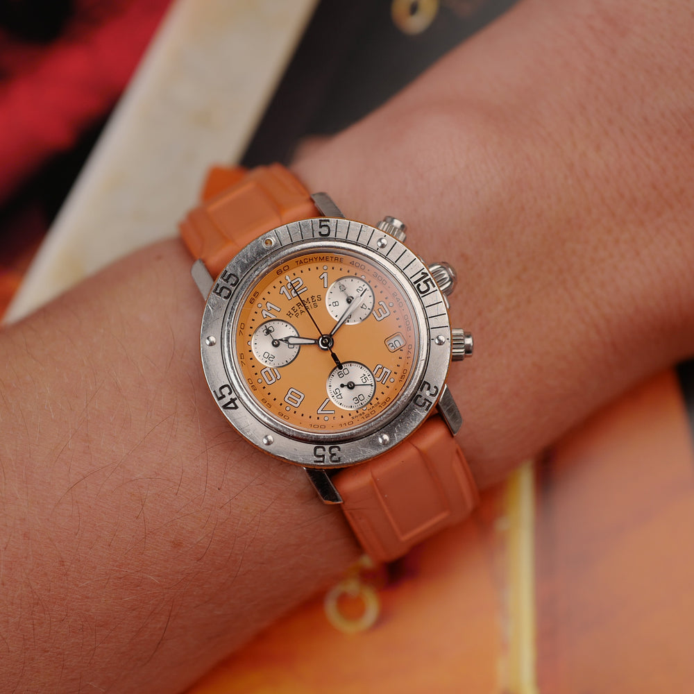 HERMÈS Clipper Chronographe « Orange Dial » – Réf. CL2.316 (Vintage 2000)