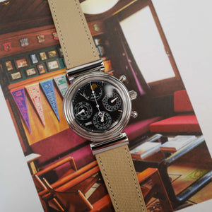 Café noir montre vintage Marseille horloger IWC Da Vinci IW3750 calendrier perpétuel 2004