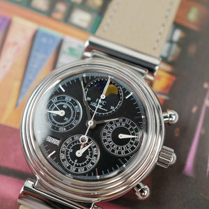 Café noir montre vintage Marseille horloger IWC Da Vinci IW3750 calendrier perpétuel 2004