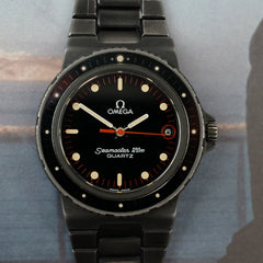 Café noir montre vintage Marseille horloger Omega Seamaster 120 quartz Nimitz PVD 1980