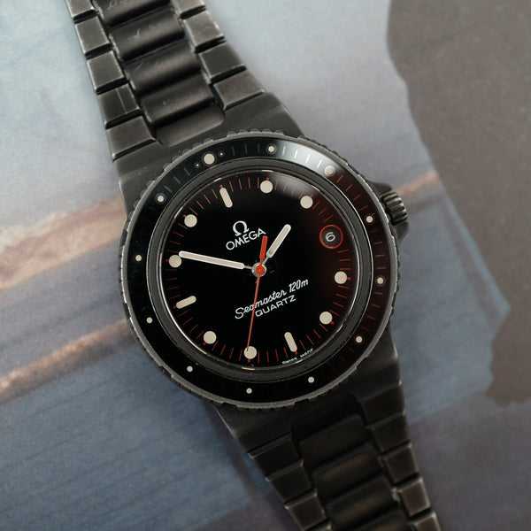 Café noir montre vintage Marseille horloger Omega Seamaster 120 quartz Nimitz PVD 1980