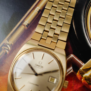 Café noir montre vintage Marseille horloger Omega Seamaster automatique plaqué or 1977