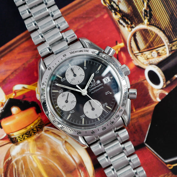 Café noir montre vintage Marseille horloger Omega Speedmaster date reduced 3511 50 automatique 1993