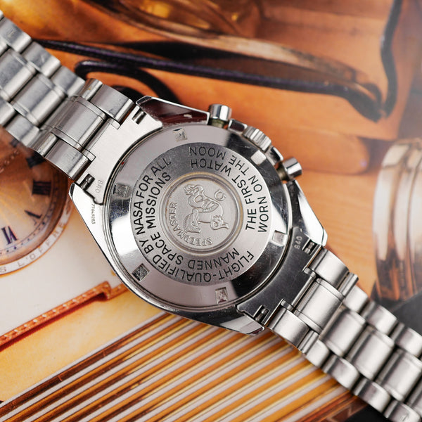 Café noir montre vintage Marseille horloger Omega Speedmaster professional Moonwatch 1450022 1990