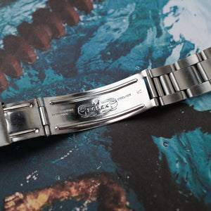 Café noir montre vintage Marseille horloger Oyster tritium Sigma