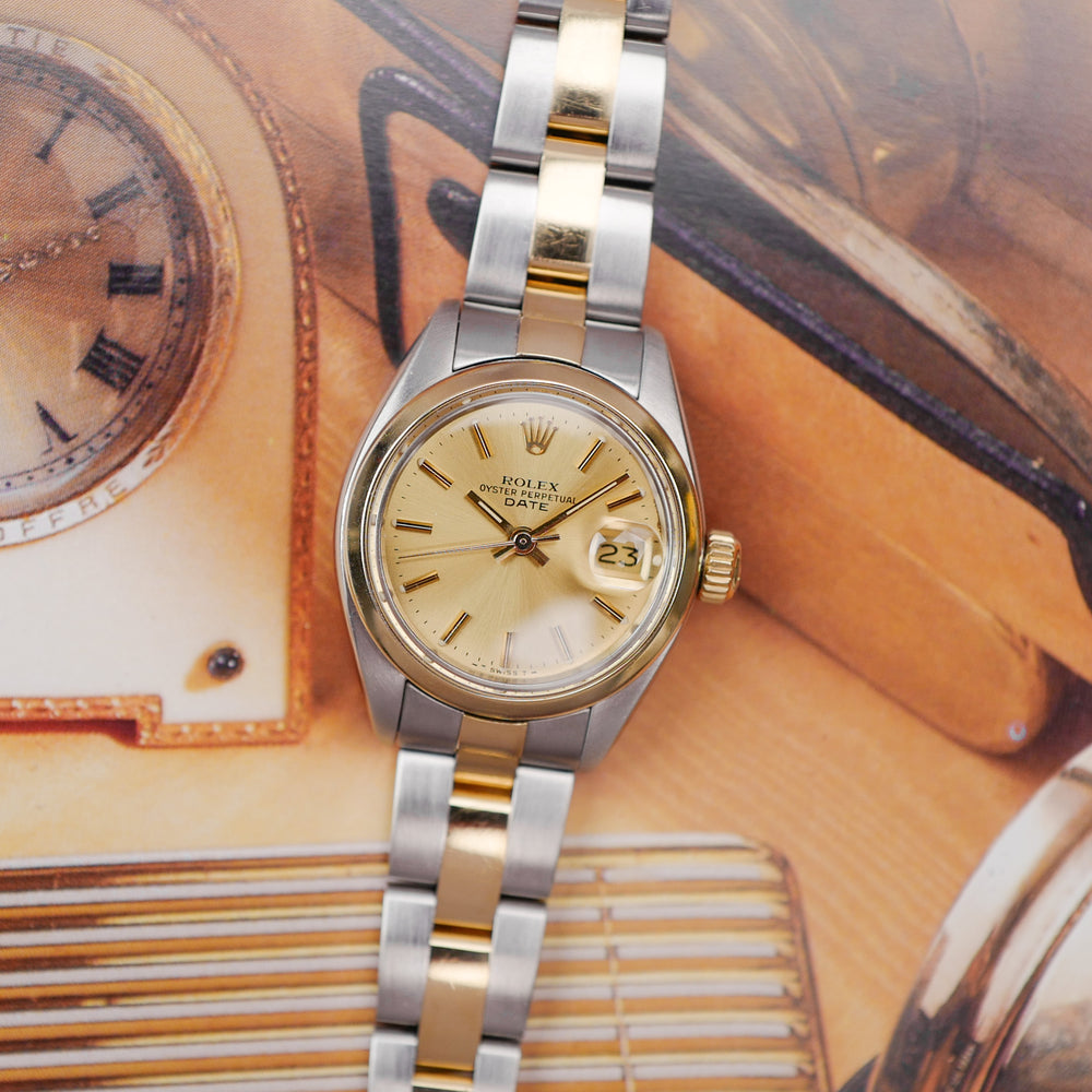 Café noir montre vintage Marseille horloger Rolex lady date 6916 or acier 1977