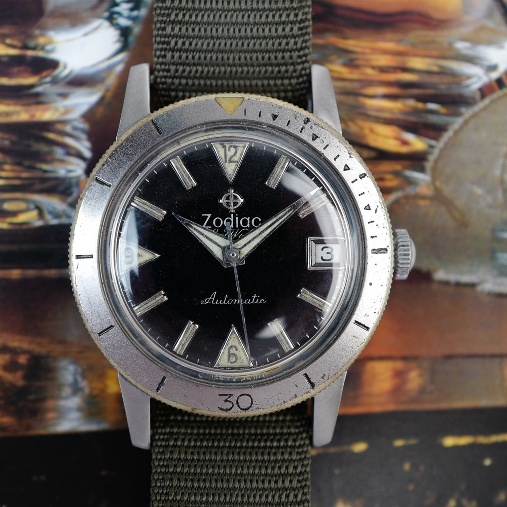 Café noir montre vintage Marseille horloger Zodiac Sea Wolf 722 946b patine