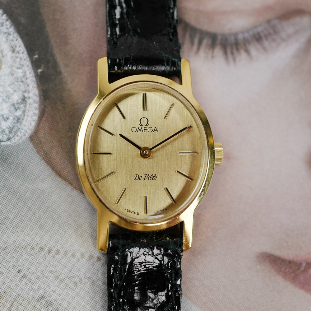 Café noir montres horloger Marseille Omega mini Ellipse dorée mécanique 1989