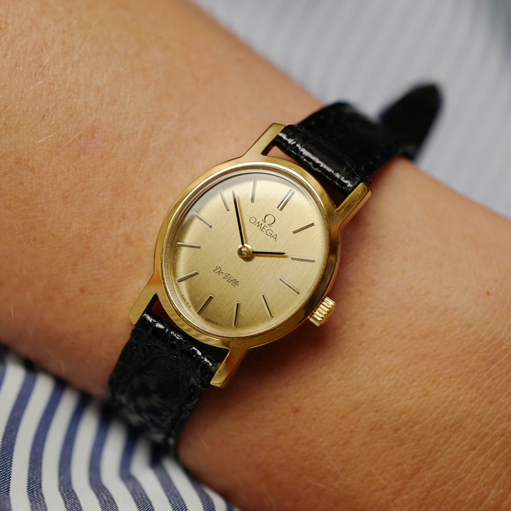 Café noir montres horloger Marseille Omega mini Ellipse dorée mécanique 1989