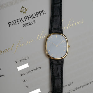 Café noir montres Marseille Patek Philippe Ellipse 3738 cadran bleu 1991 papiers boîte