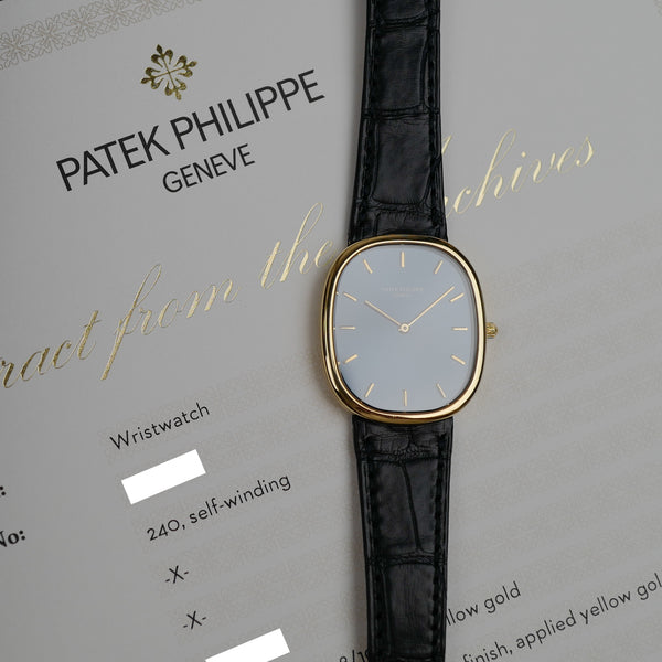 Café noir montres Marseille Patek Philippe Ellipse 3738 cadran bleu 1991 papiers boîte