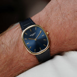 Café noir montres Marseille Patek Philippe Ellipse 3738 cadran bleu 1991 papiers boîte