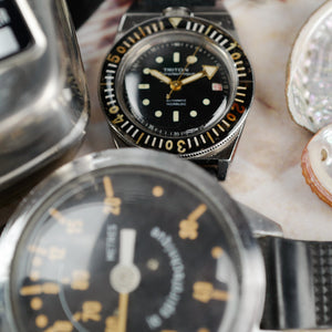 Café noir montres vintage horloger rachat Marseille Aix Triton Spirotechnique plongeuse Cousteau années 1960