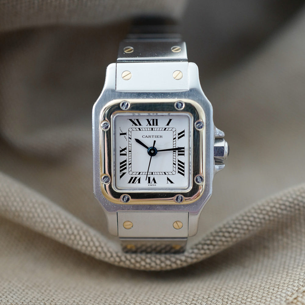 Jolie montre Cartier femme ancienne Santos Tank or