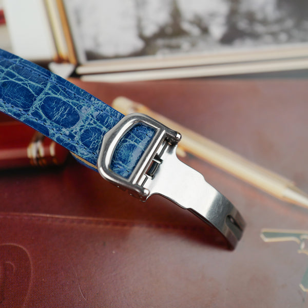 Boucle déployante Cartier sur bracelet bleu