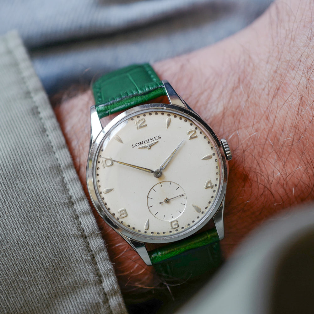 Jolie montre fine extra plate Longines de costume années 1960 vintage