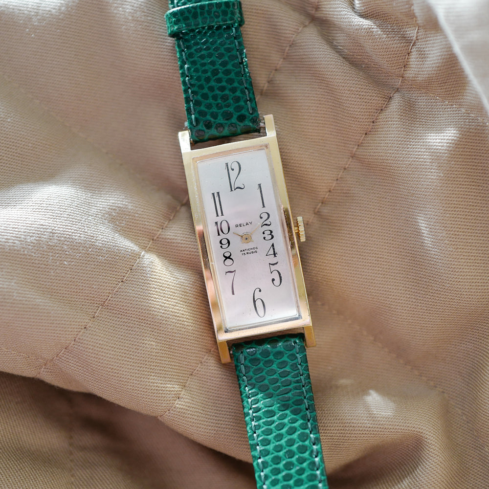 Montre femme vintage mécanique or cintrée