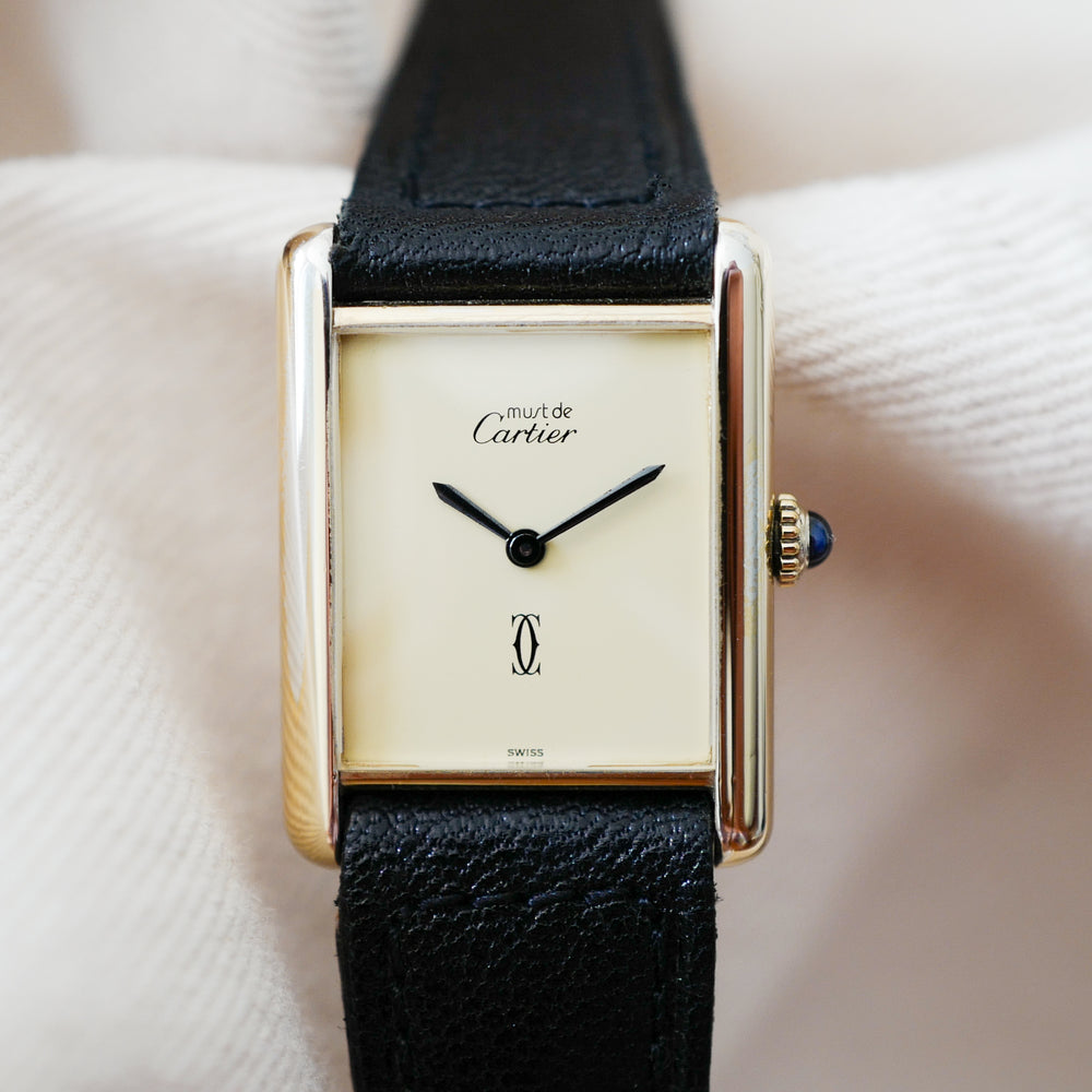 rare montre cartier tank must grand modele dorée homme femme