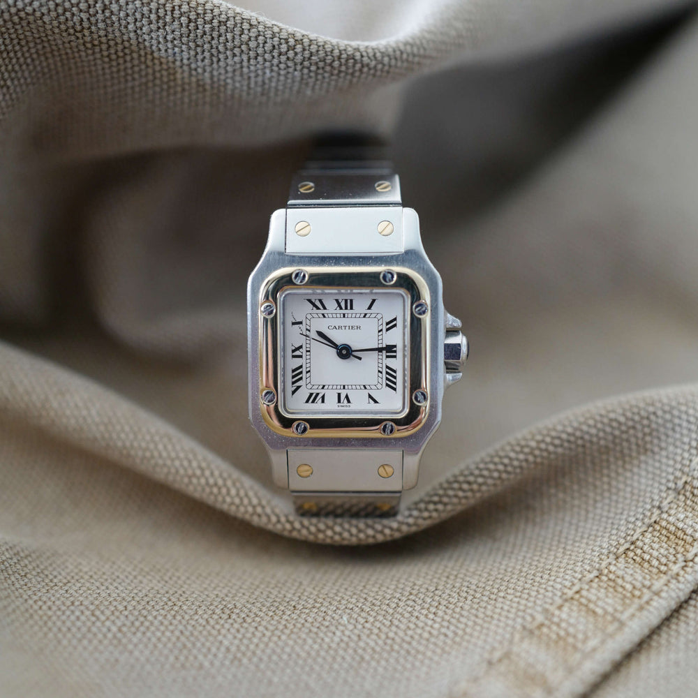 Jolie montre Cartier femme ancienne Santos Tank or