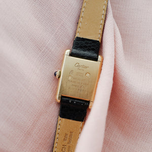 Jolie montre Cartier Tank femme