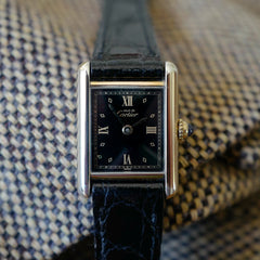 jolie montre cartier tank noir vintage pour femme