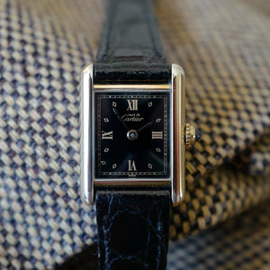 jolie montre cartier tank noir vintage pour femme