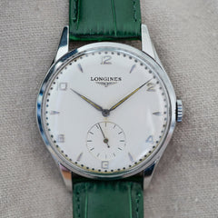 Jolie montre fine extra plate Longines de costume années 1960 vintage