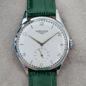 Jolie montre fine extra plate Longines de costume années 1960 vintage