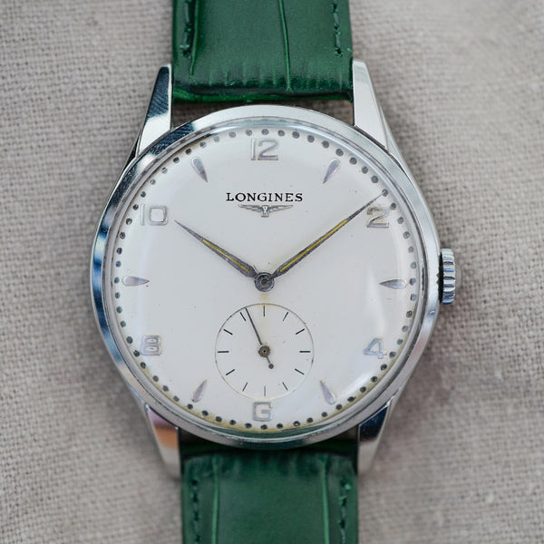 Jolie montre fine extra plate Longines de costume années 1960 vintage