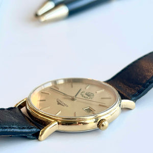 Jolie montre Longines or dorée vintage