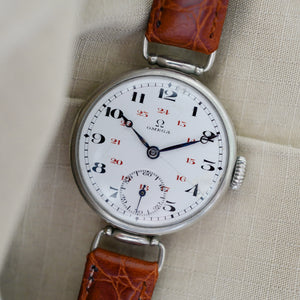 Jolie montre Omega vintage trench