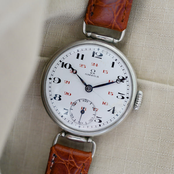 Jolie montre Omega vintage trench
