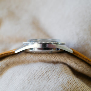 Jolie montre patinée vintage homme
