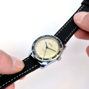 Jolie montre ronde ancienne mécanique