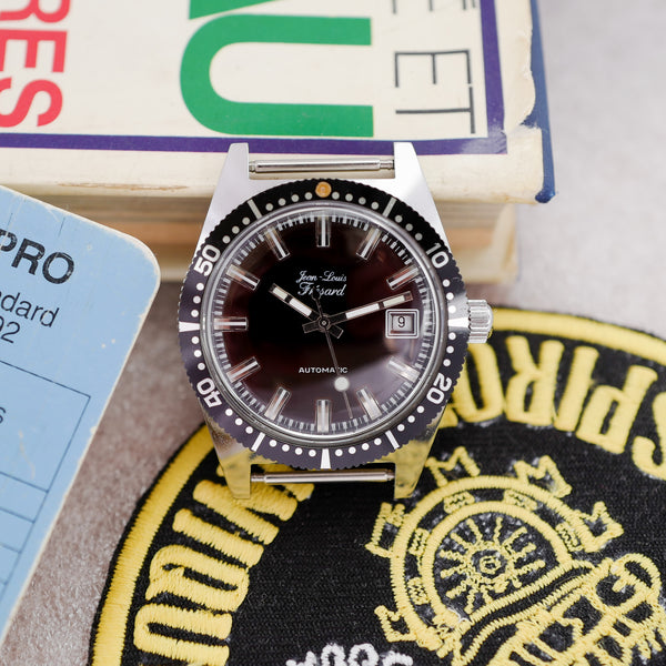 Jolie montre skin diver ancienne
