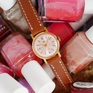 Mini montre femme dorée vintage