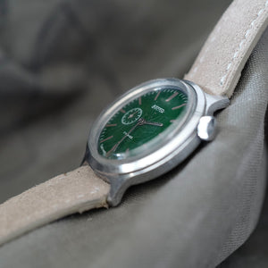Montre ancienne cadran vert patine